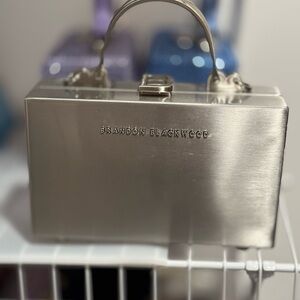 Brandon Blackwood Silver Metallic Trunk Bag